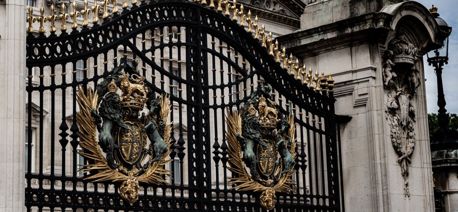 Ornate iron gate with scrolled top bars