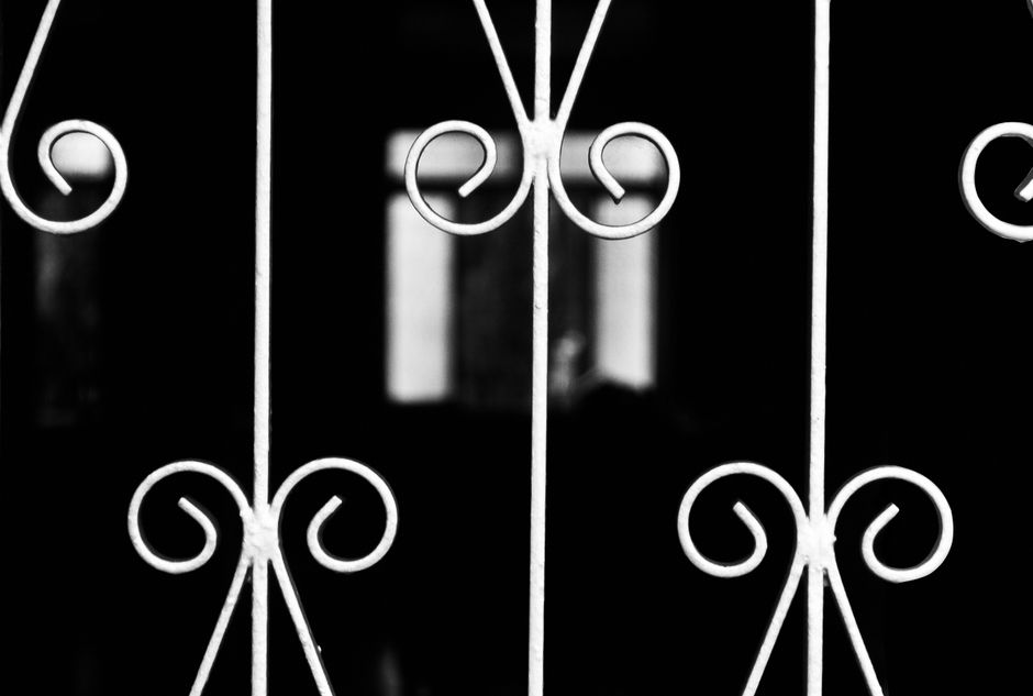 Iron gate bars photographed in black and white